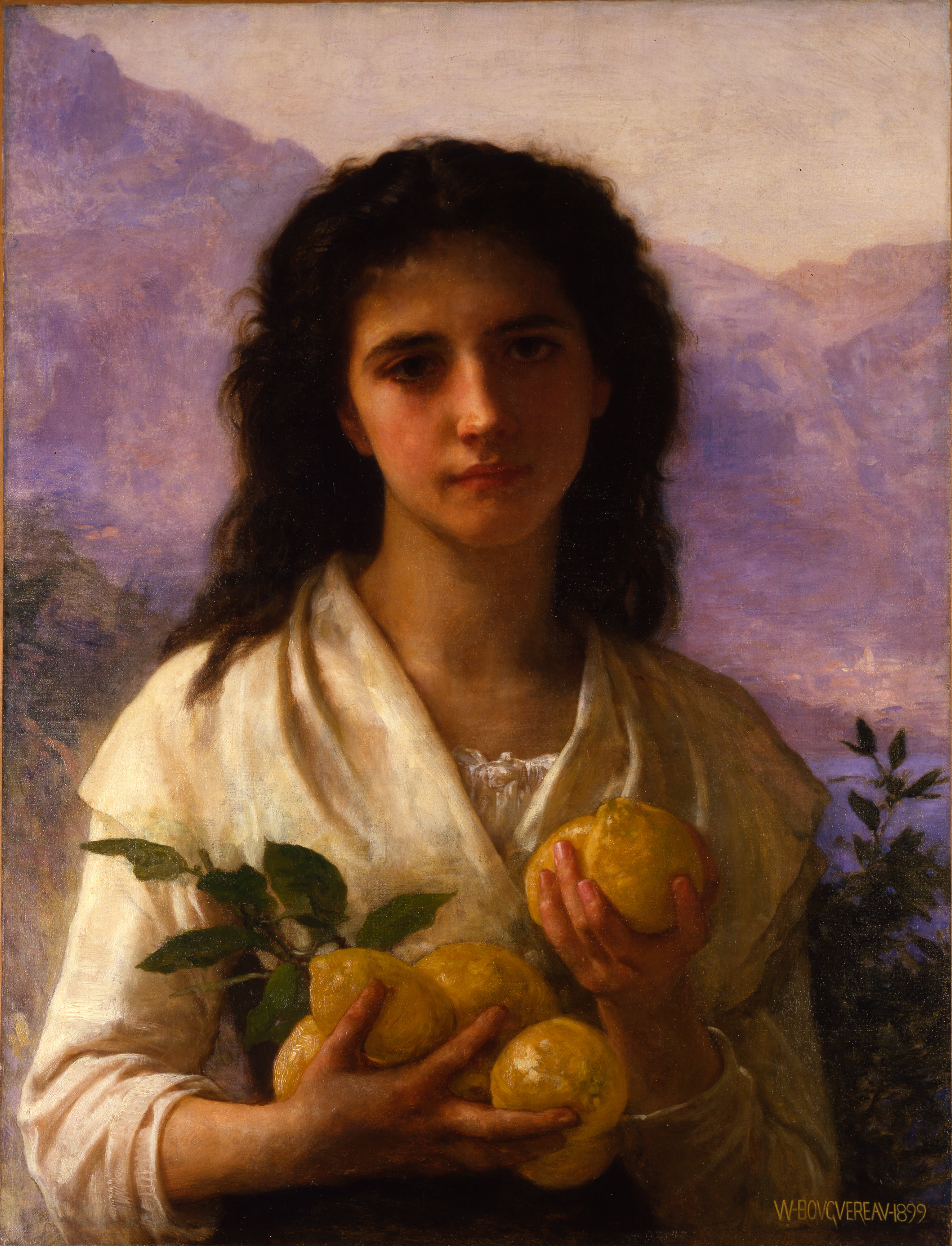 A dark-haired young woman in a simple white shirt and shawl, holding several bright yellow lemons with leaves still attached.
